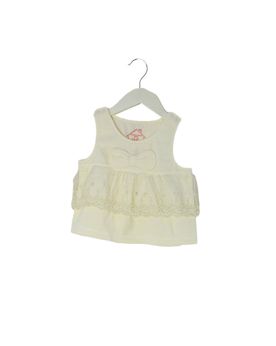 A Ivory Sleeveless Tops from Chickeeduck in size 3-6M for girl. (Front View)