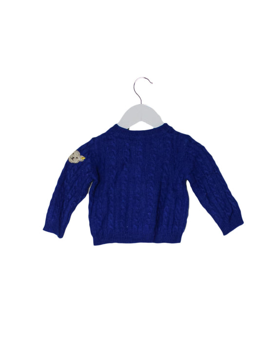 A Blue Cardigans from Steiff in size 3-6M for girl. (Back View)