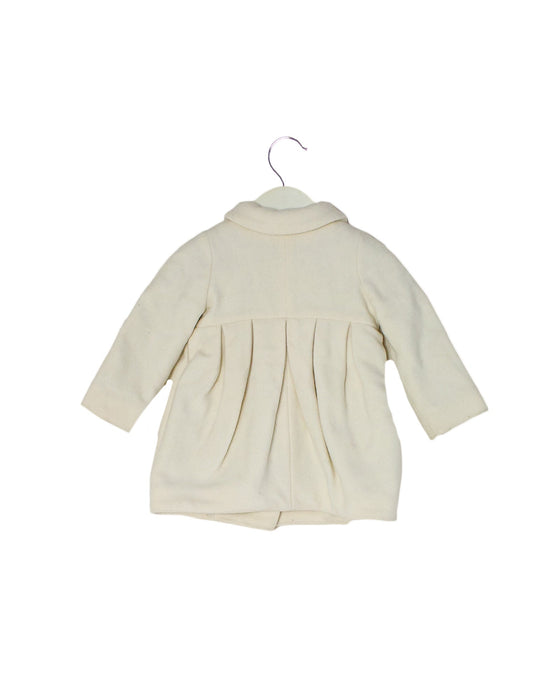 A Ivory Coats from I Pinco Pallino in size 6-12M for girl. (Back View)