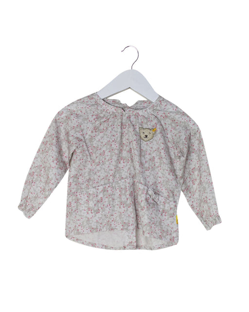 A Grey Long Sleeve Tops from Steiff in size 6-12M for girl. (Front View)