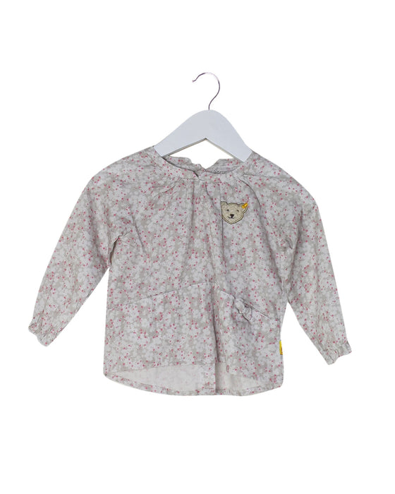 A Grey Long Sleeve Tops from Steiff in size 6-12M for girl. (Front View)