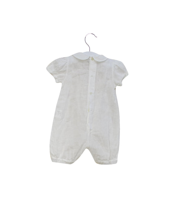 A Ivory Short Sleeve Rompers from Chickeeduck in size 6-12M for girl. (Back View)