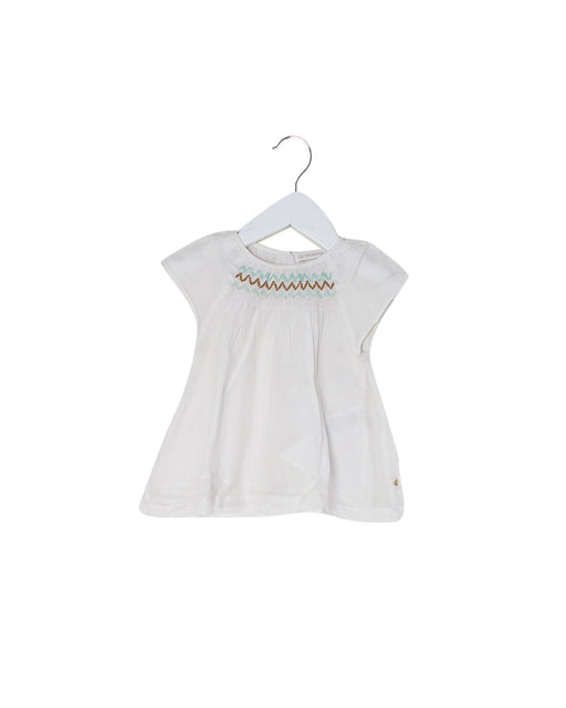 A White Short Sleeve Tops from Les Enfantines in size 6-12M for girl. (Front View)