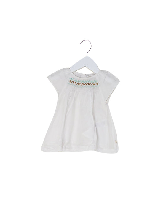 A White Short Sleeve Tops from Les Enfantines in size 6-12M for girl. (Front View)