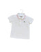 A White Short Sleeve Polos from Lacoste in size 6-12M for girl. (Front View)