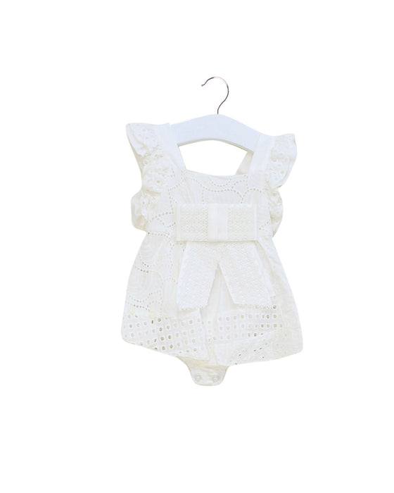 A White Sleeveless Bodysuits from Nicholas & Bears in size 3-6M for girl. (Front View)