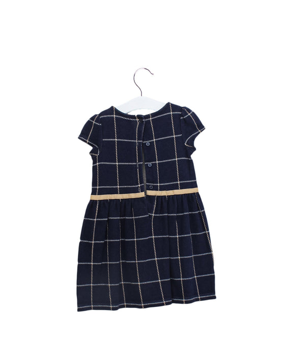 A Navy Short Sleeve Dresses from Janie & Jack in size 4T for girl. (Back View)