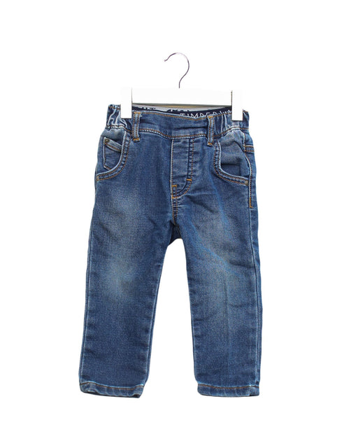 A Blue Jeans from Timberland in size 6-12M for boy. (Front View)