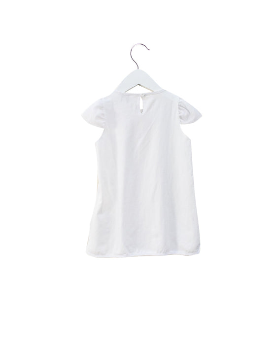 A White Sleeveless Tops from Armani in size 3T for girl. (Back View)