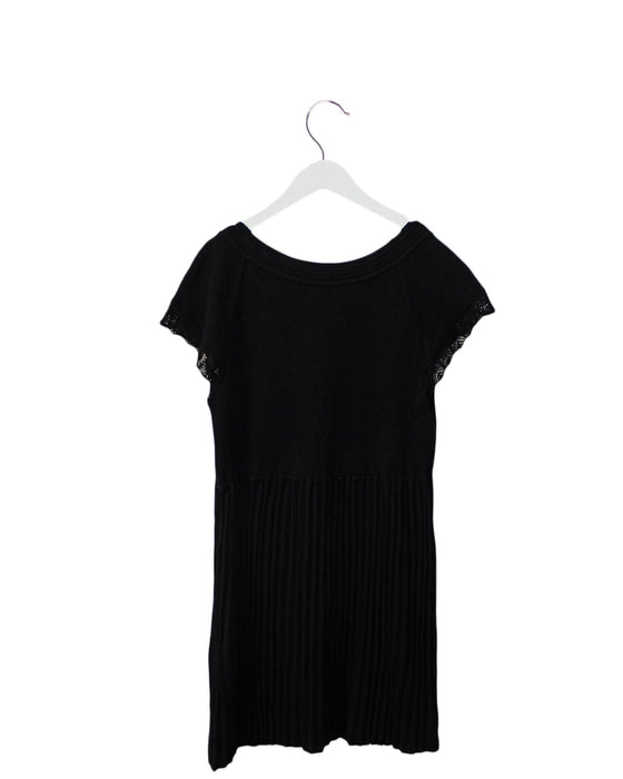 A Black Short Sleeve Dresses from Comme Ca Du Mode in size 8Y for girl. (Back View)