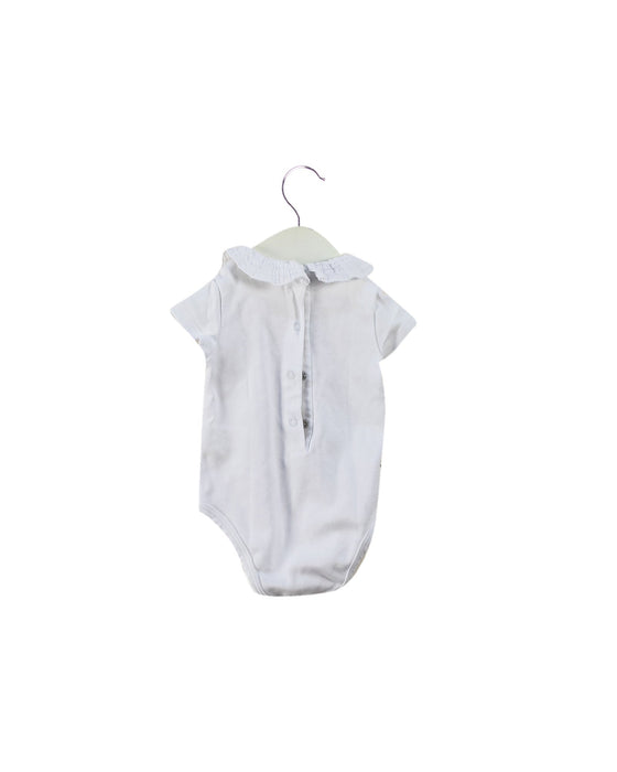 A White Short Sleeve Bodysuits from Nanos in size 0-3M for girl. (Back View)
