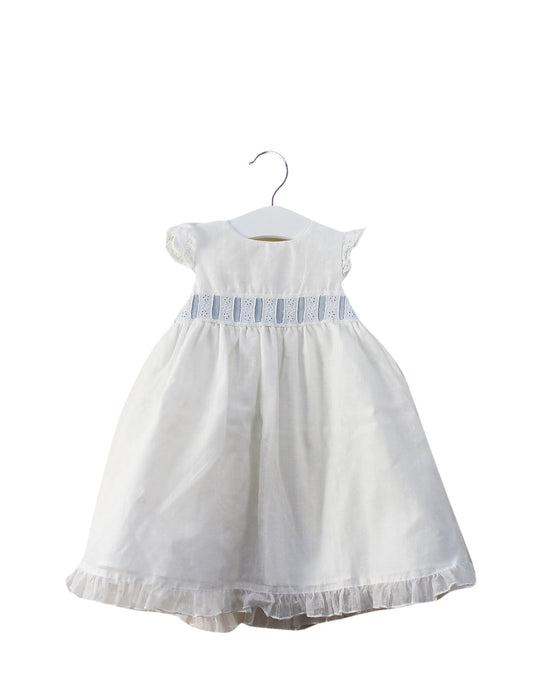 A White Dress Sets from Tizzas in size 6-12M for girl. (Front View)