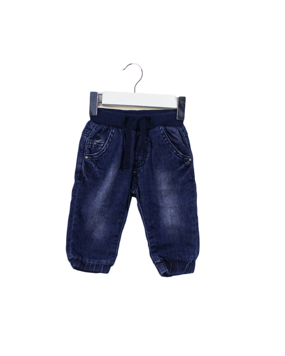 A Navy Jeans from Noppies in size 0-3M for neutral. (Front View)
