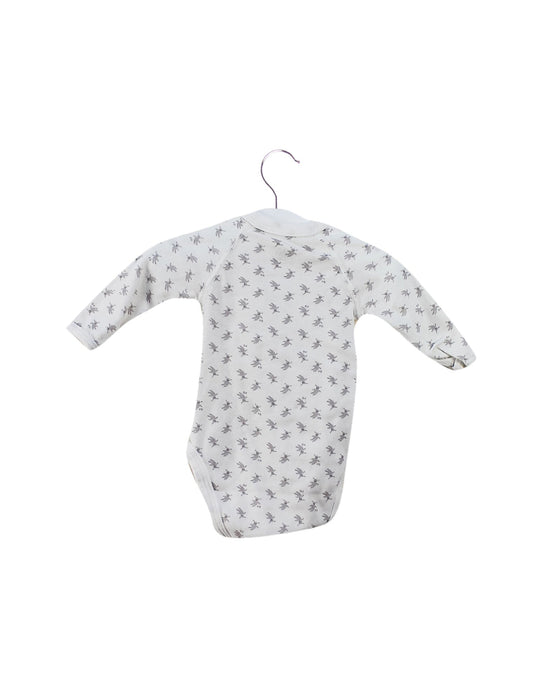 A White Long Sleeve Bodysuits from Petit Bateau in size 0-3M for neutral. (Back View)