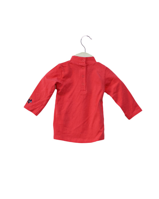 A Orange Long Sleeve Tops from DPAM in size 3-6M for girl. (Back View)