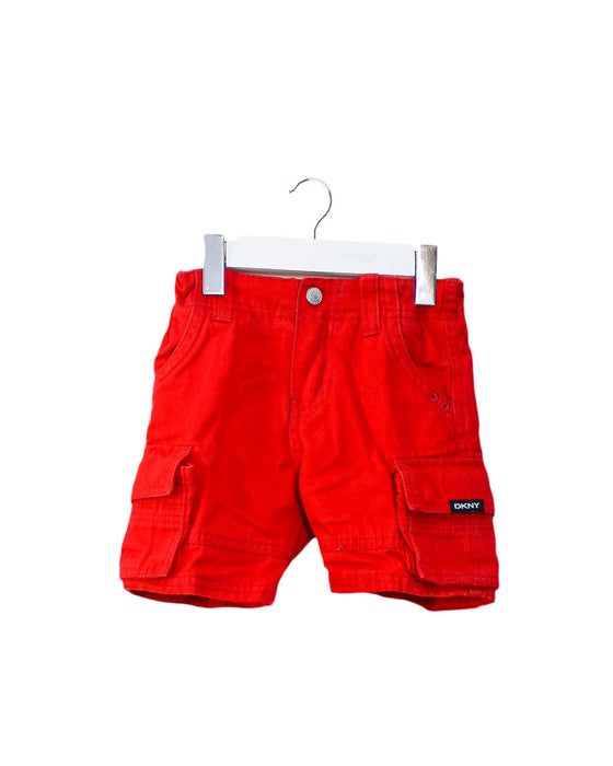 A Red Shorts from DKNY in size 6-12M for boy. (Front View)