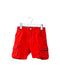 A Red Shorts from DKNY in size 6-12M for boy. (Front View)