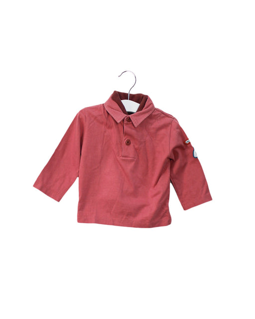 A Pink Long Sleeve Polos from Jacadi in size 6-12M for boy. (Front View)