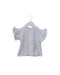 A White Sleeveless Tops from Seed in size 6-12M for girl. (Front View)