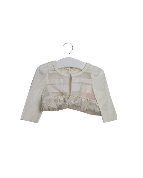 A Ivory Cardigans from Nicholas & Bears in size 6-12M for girl. (Front View)