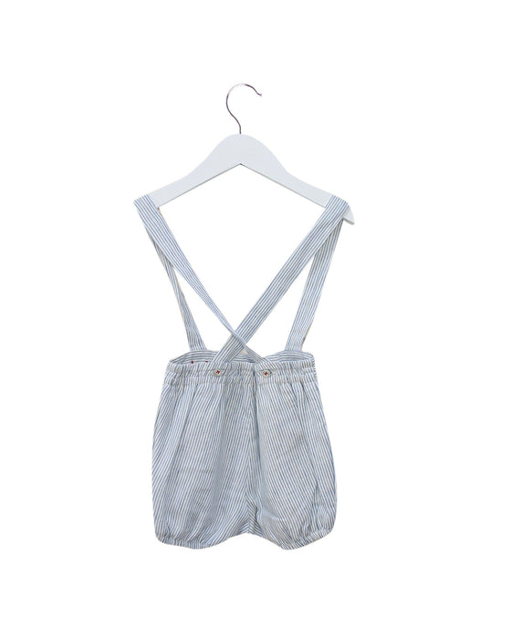 A Blue Overall Shorts from Pili Carrera in size 12-18M for girl. (Back View)