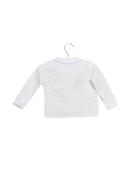 A White Shirts from Acanthe in size 0-3M for girl. (Back View)