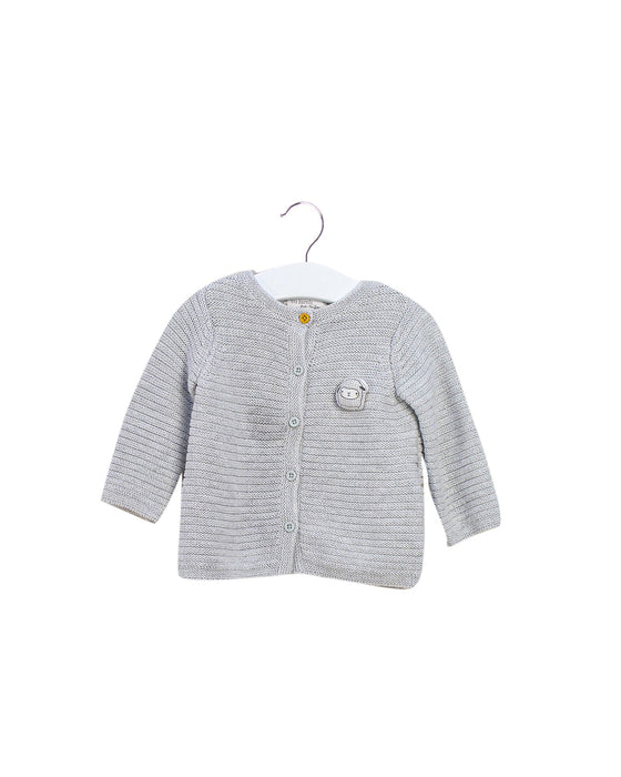 A Grey Cardigans from DPAM in size 6-12M for girl. (Front View)