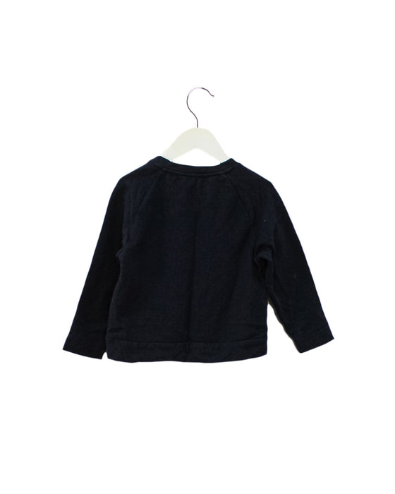 A Navy Crewneck Sweatshirts from Jacadi in size 4T for girl. (Back View)