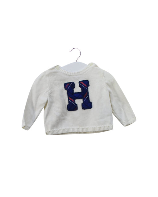 A Ivory Knit Sweaters from Tommy Hilfiger in size 6-12M for girl. (Front View)