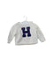 A Ivory Knit Sweaters from Tommy Hilfiger in size 6-12M for girl. (Front View)