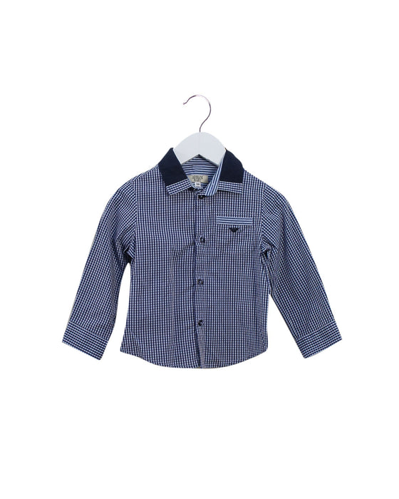 A Navy Shirts from Armani in size 6-12M for boy. (Front View)
