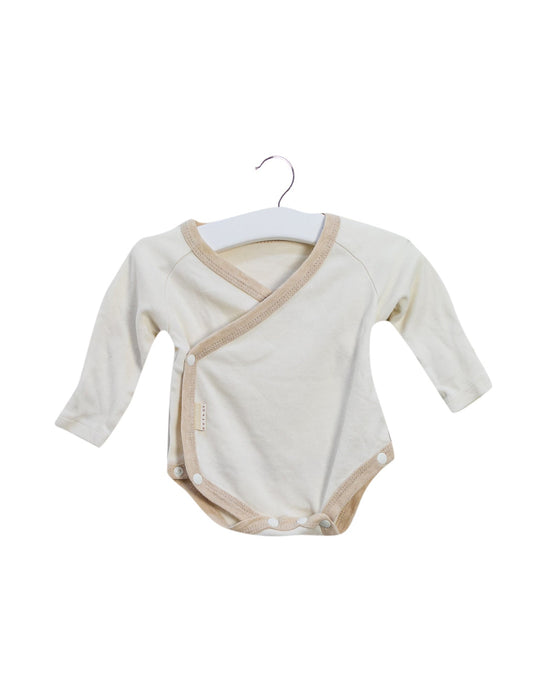A Ivory Long Sleeve Bodysuits from Natures Purest in size 0-3M for girl. (Front View)