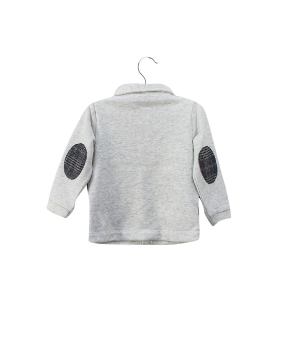 A Ivory Shirts from Chickeeduck in size 6-12M for boy. (Back View)