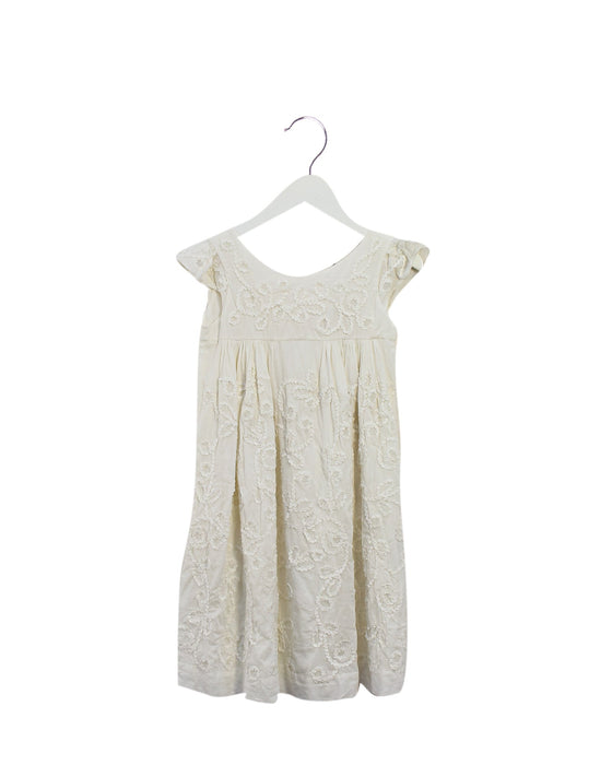 A Ivory Short Sleeve Dresses from Bonpoint in size 4T for girl. (Front View)