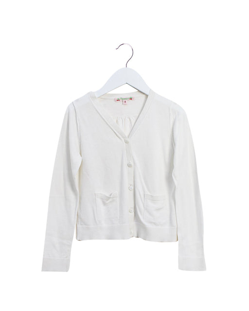 A White Cardigans from Bonpoint in size 8Y for girl. (Front View)