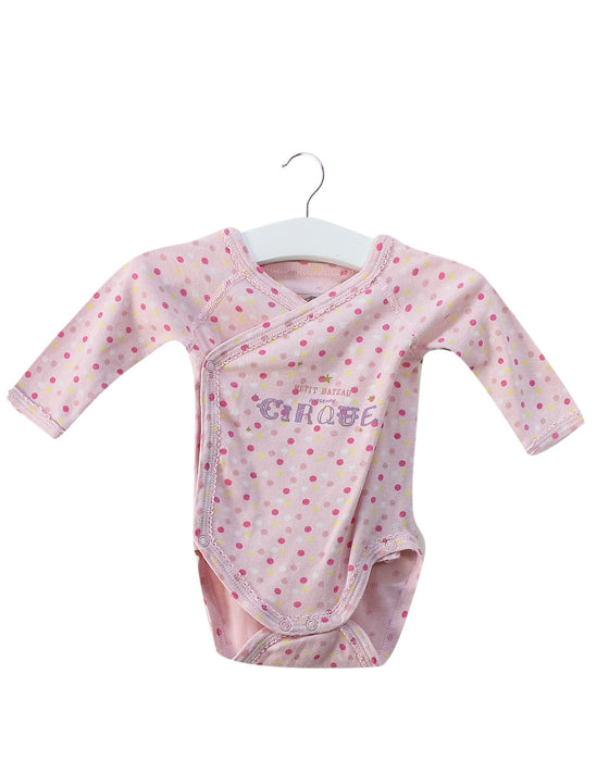 A Pink Long Sleeve Bodysuits from Petit Bateau in size 0-3M for girl. (Front View)