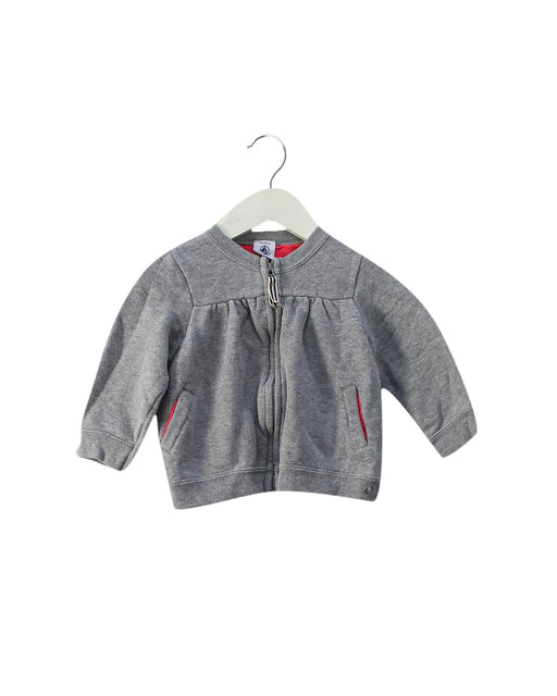 A Grey Zippered Sweatshirts from Petit Bateau in size 12-18M for girl. (Front View)