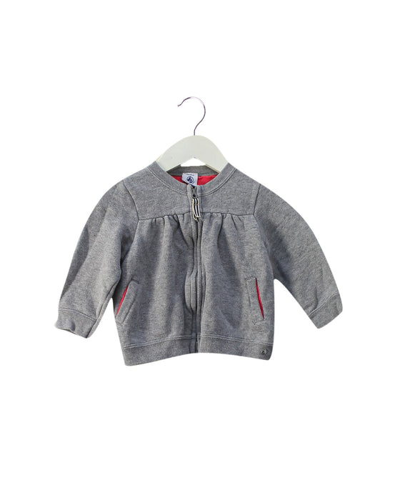 A Grey Zippered Sweatshirts from Petit Bateau in size 12-18M for girl. (Front View)
