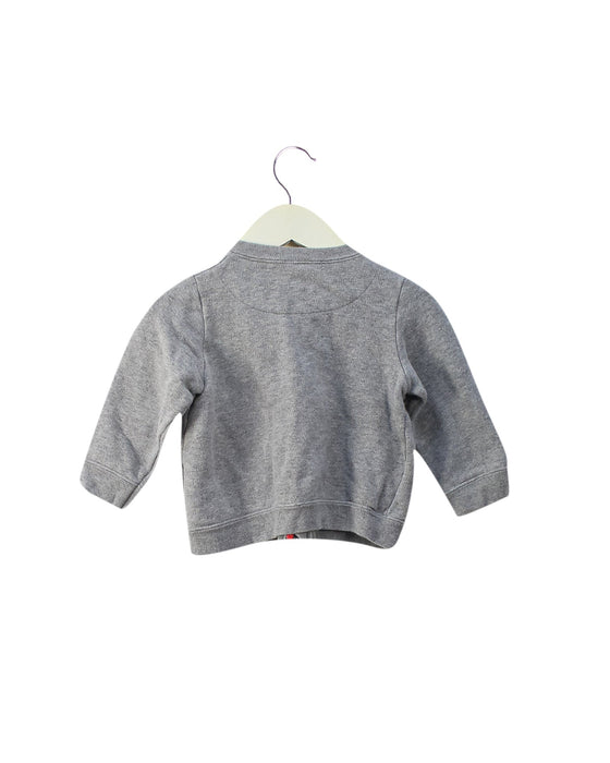 A Grey Zippered Sweatshirts from Petit Bateau in size 12-18M for girl. (Back View)