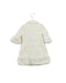 A Ivory Coats from Nicholas & Bears in size 6-12M for girl. (Back View)