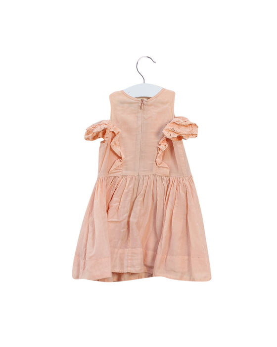 A Orange Short Sleeve Dresses from Nellystella in size 6-12M for girl. (Back View)