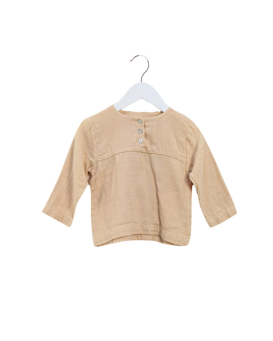 A Peach Long Sleeve Tops from Poudre Organic in size 3-6M for girl. (Front View)