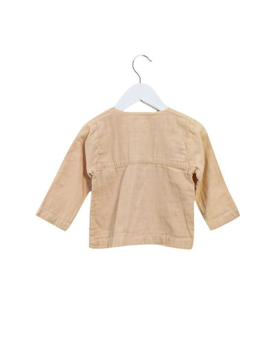 A Peach Long Sleeve Tops from Poudre Organic in size 3-6M for girl. (Back View)