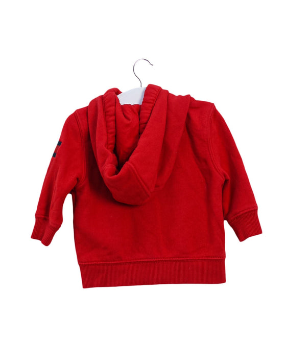 A Red Zippered Sweatshirts from Tommy Hilfiger in size 6-12M for boy. (Back View)