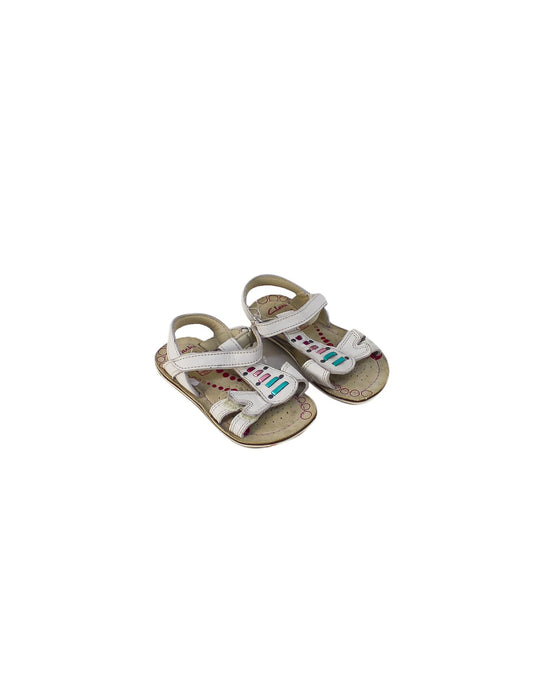 A Ivory Sandals from Clarks in size 3T for girl. (Front View)