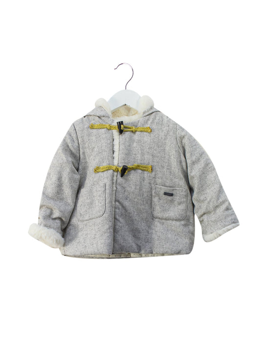 A Grey Puffer/Quilted Jackets from Nanos in size 18-24M for girl. (Front View)