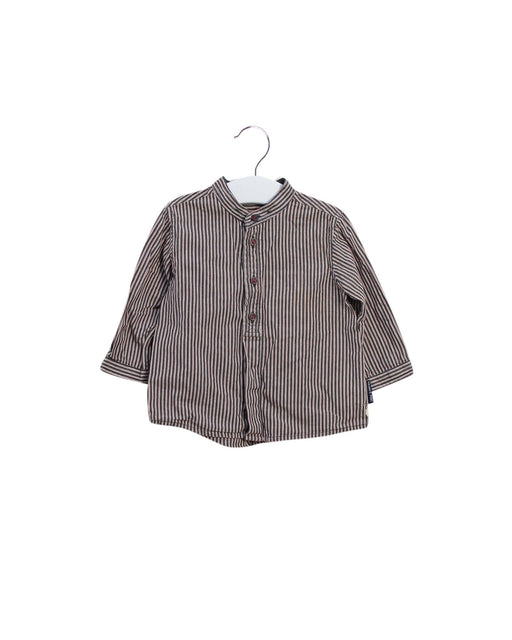 A Black Shirts from Polarn O. Pyret in size 6-12M for girl. (Front View)