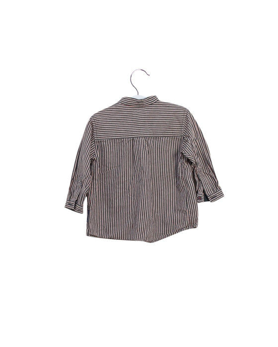 A Black Shirts from Polarn O. Pyret in size 6-12M for girl. (Back View)