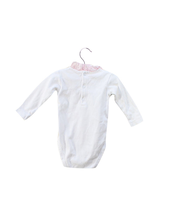 A White Long Sleeve Bodysuits from Jacadi in size 3-6M for girl. (Back View)