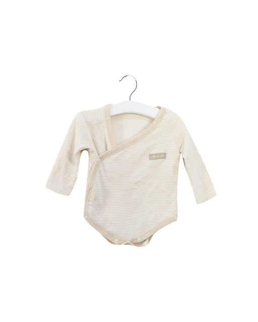 A Beige Long Sleeve Bodysuits from Natures Purest in size 3-6M for girl. (Front View)